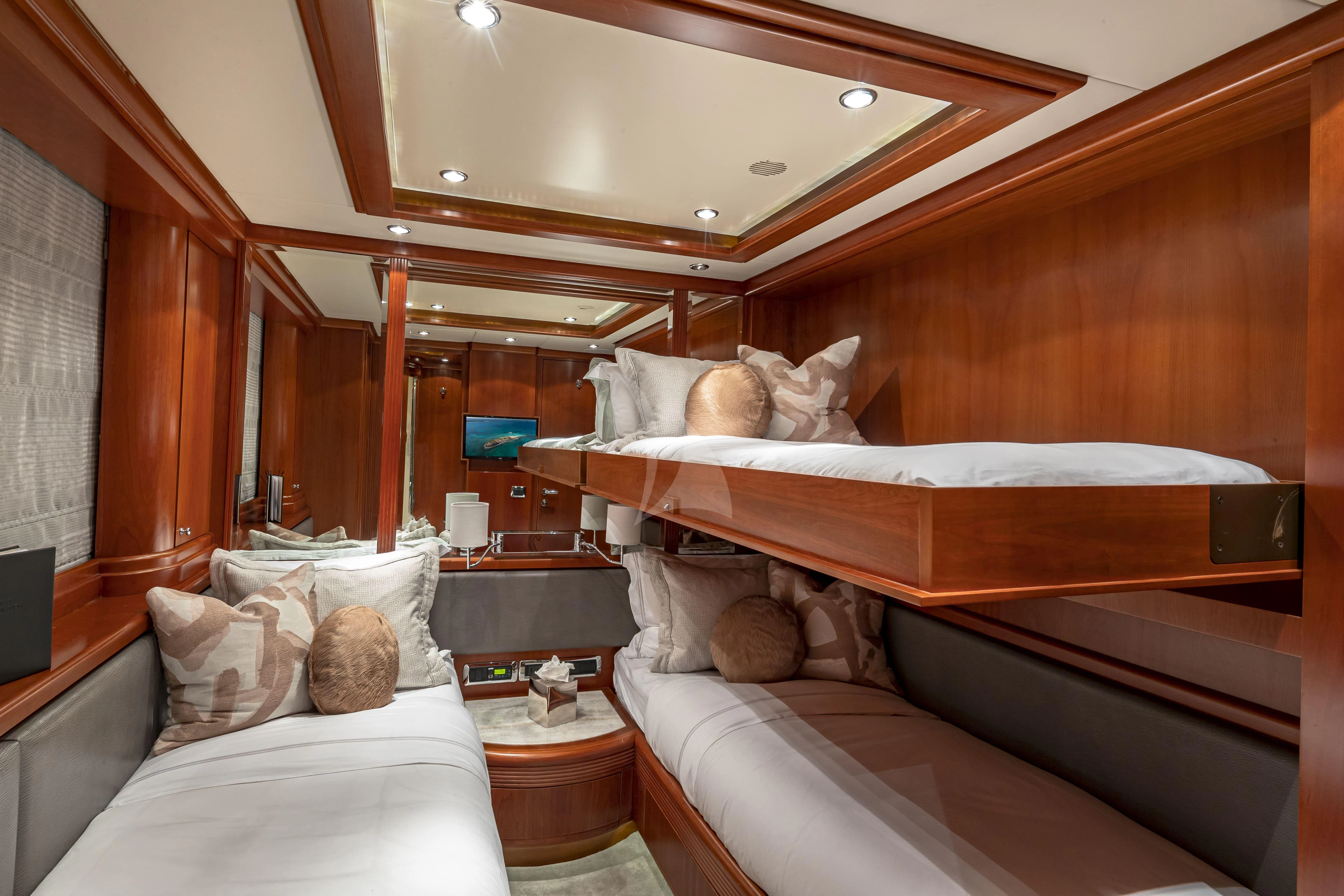 a cat sitting on a bed aboard SWEET EMOCEAN Yacht for Sale