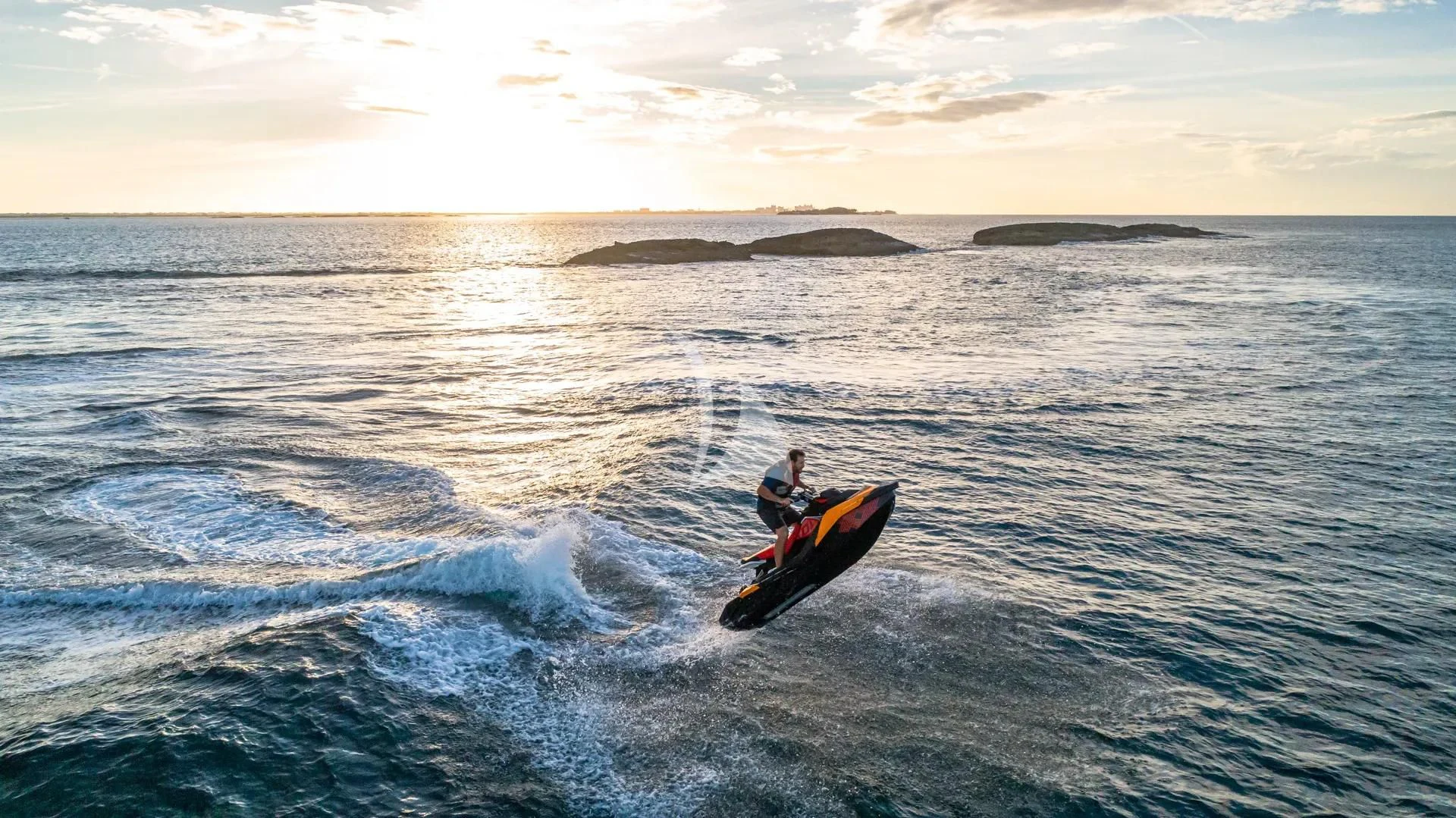 a person on a jet ski aboard SWEET EMOCEAN Yacht for Sale
