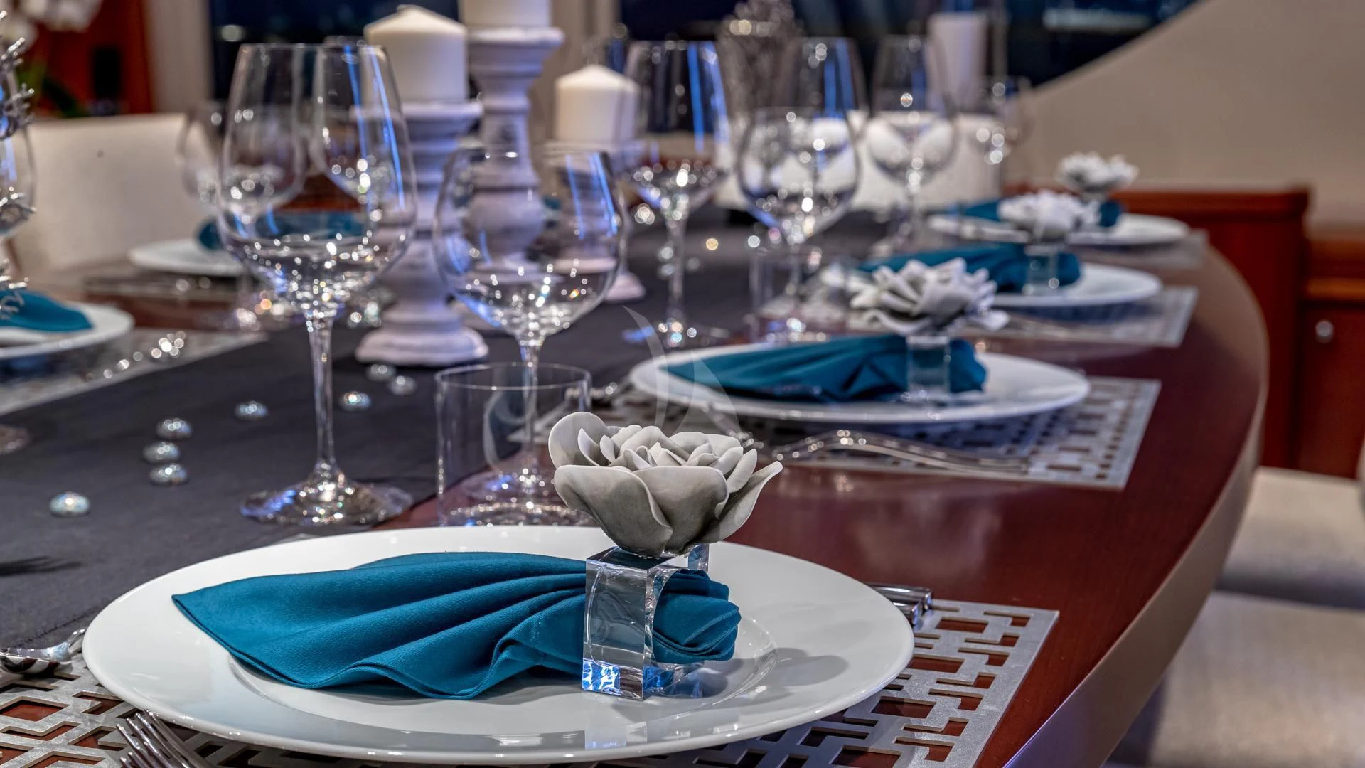 a table with plates and glasses aboard SWEET EMOCEAN Yacht for Sale