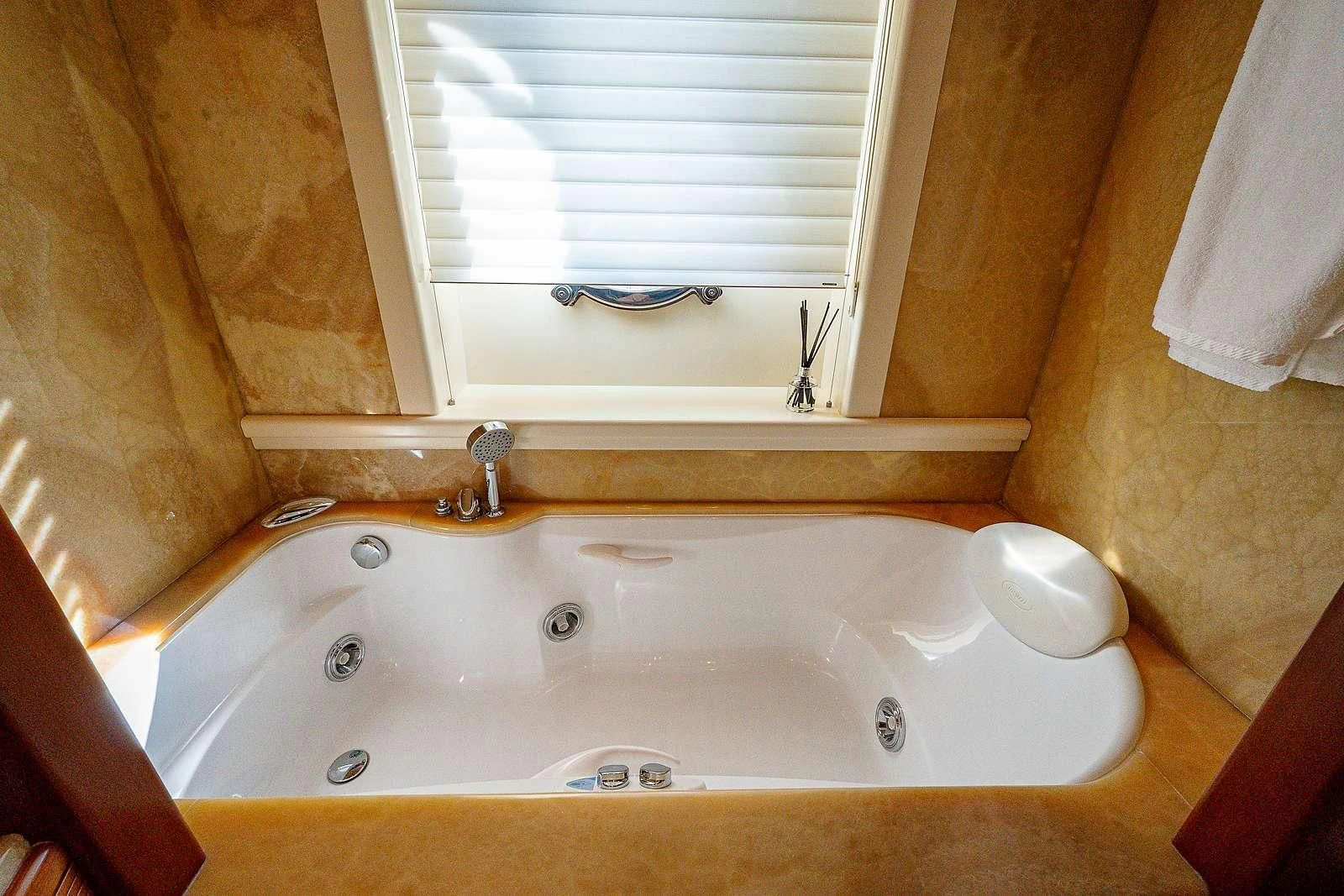 a bathtub with a sink aboard SWEET EMOCEAN Yacht for Sale