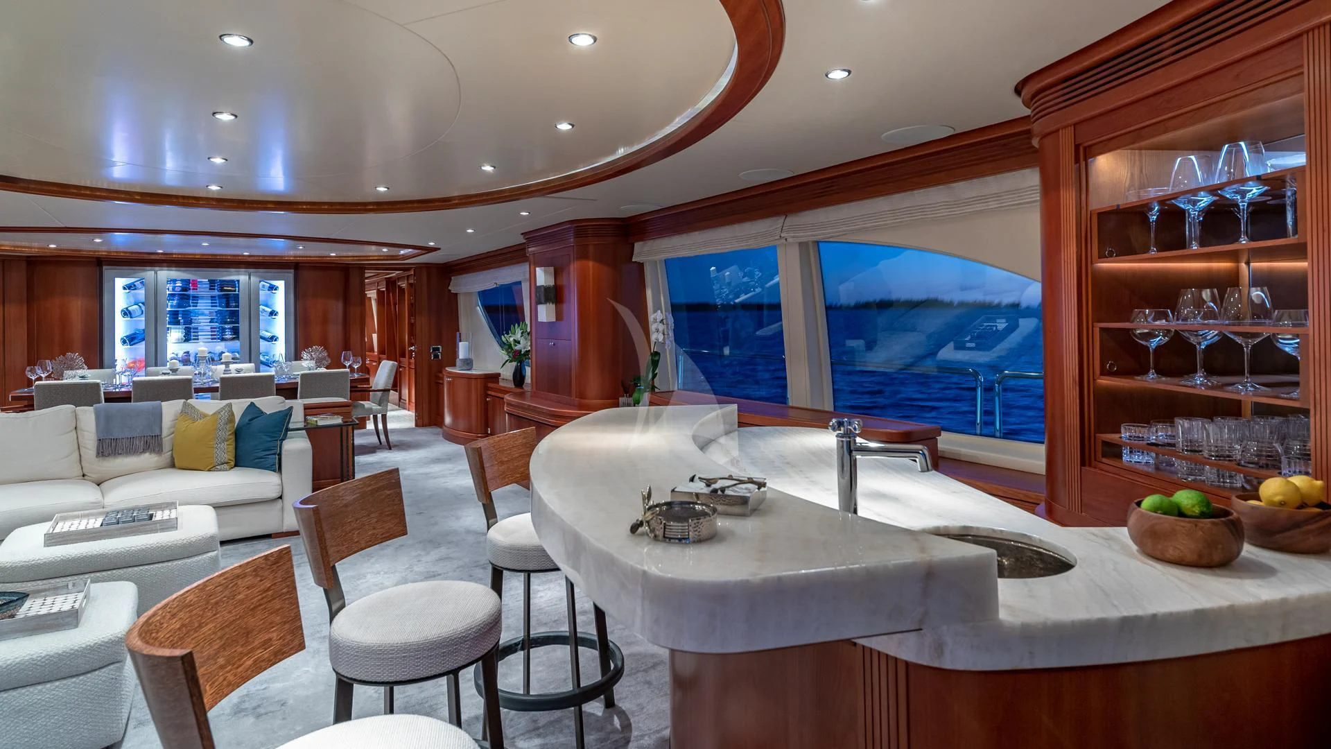 a room with a table and chairs aboard SWEET EMOCEAN Yacht for Sale