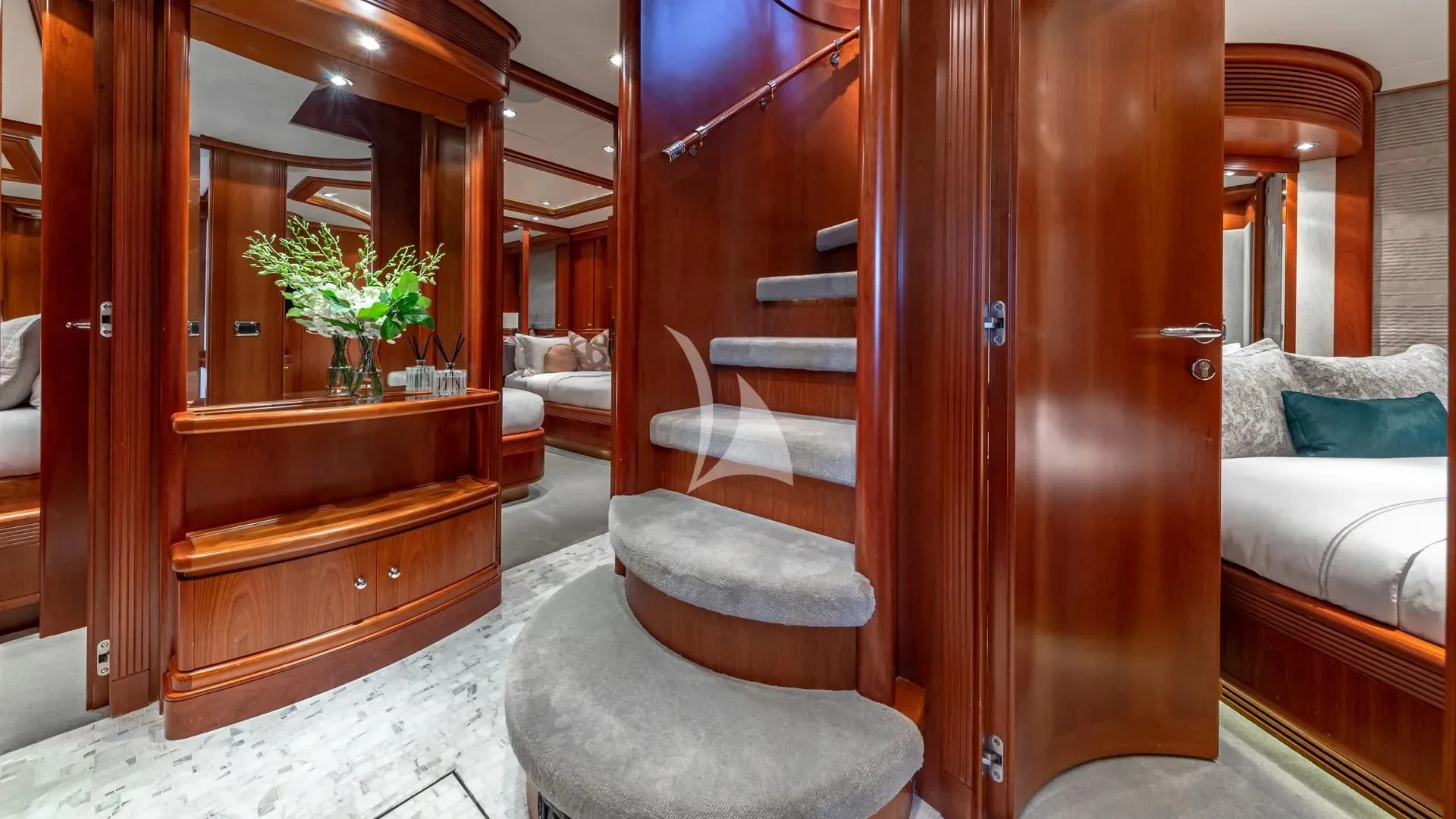a room with a bed and a chair aboard SWEET EMOCEAN Yacht for Sale