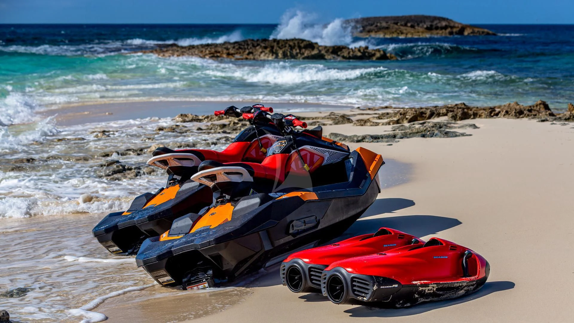 a group of toy cars on a beach aboard SWEET EMOCEAN Yacht for Sale