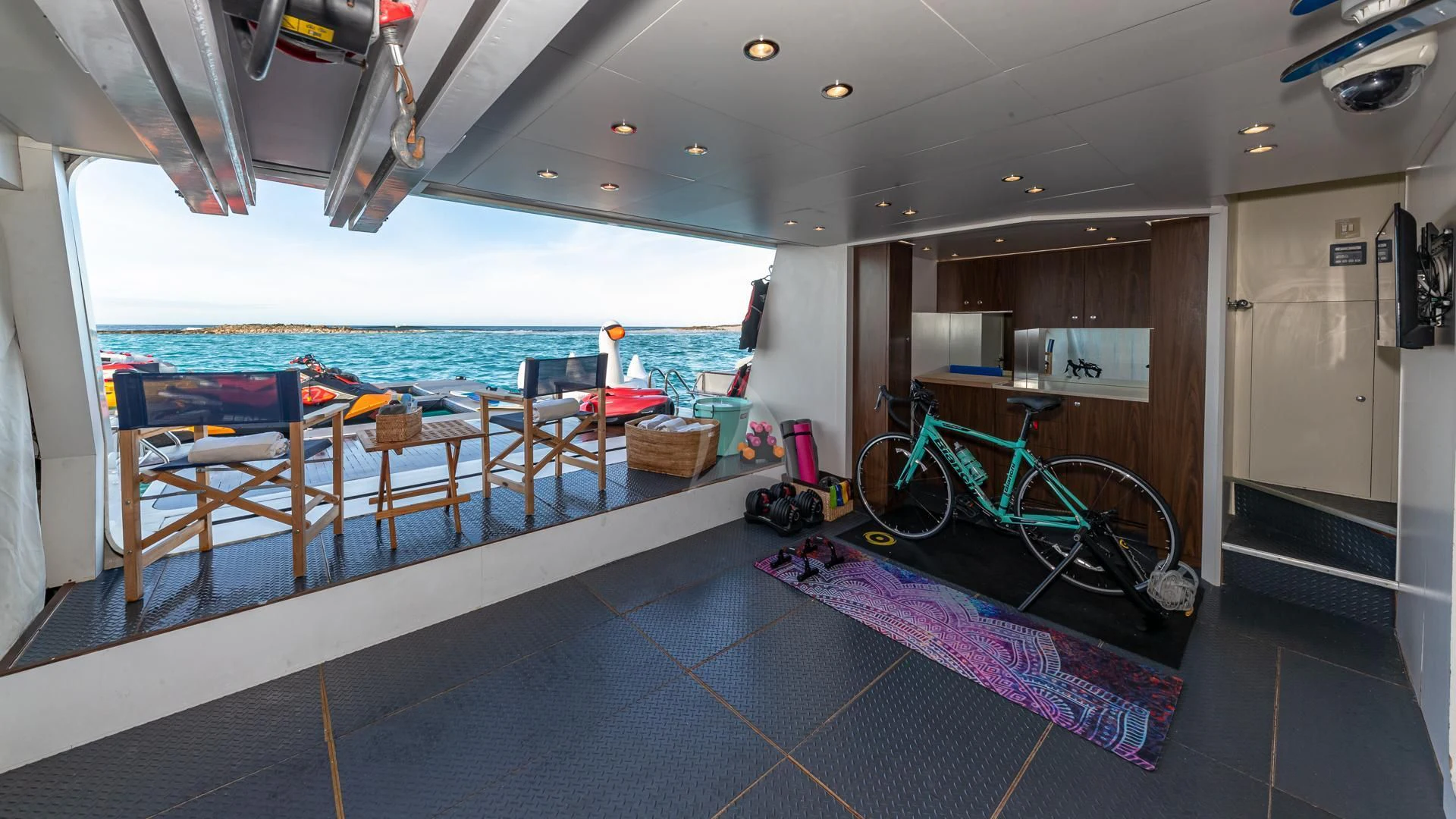 a bike parked on a boat aboard SWEET EMOCEAN Yacht for Sale