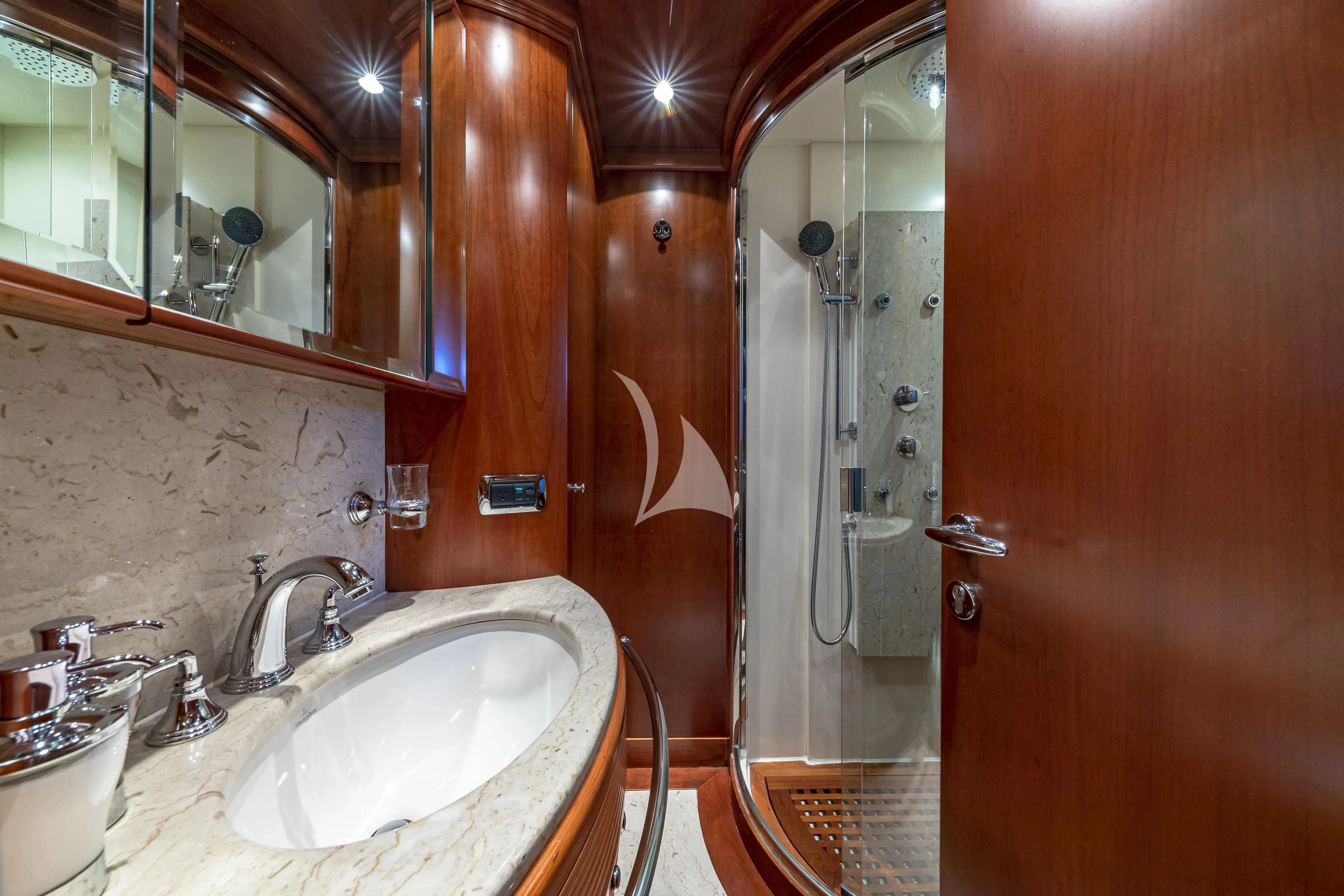 a bathroom with a sink and a shower aboard SWEET EMOCEAN Yacht for Sale