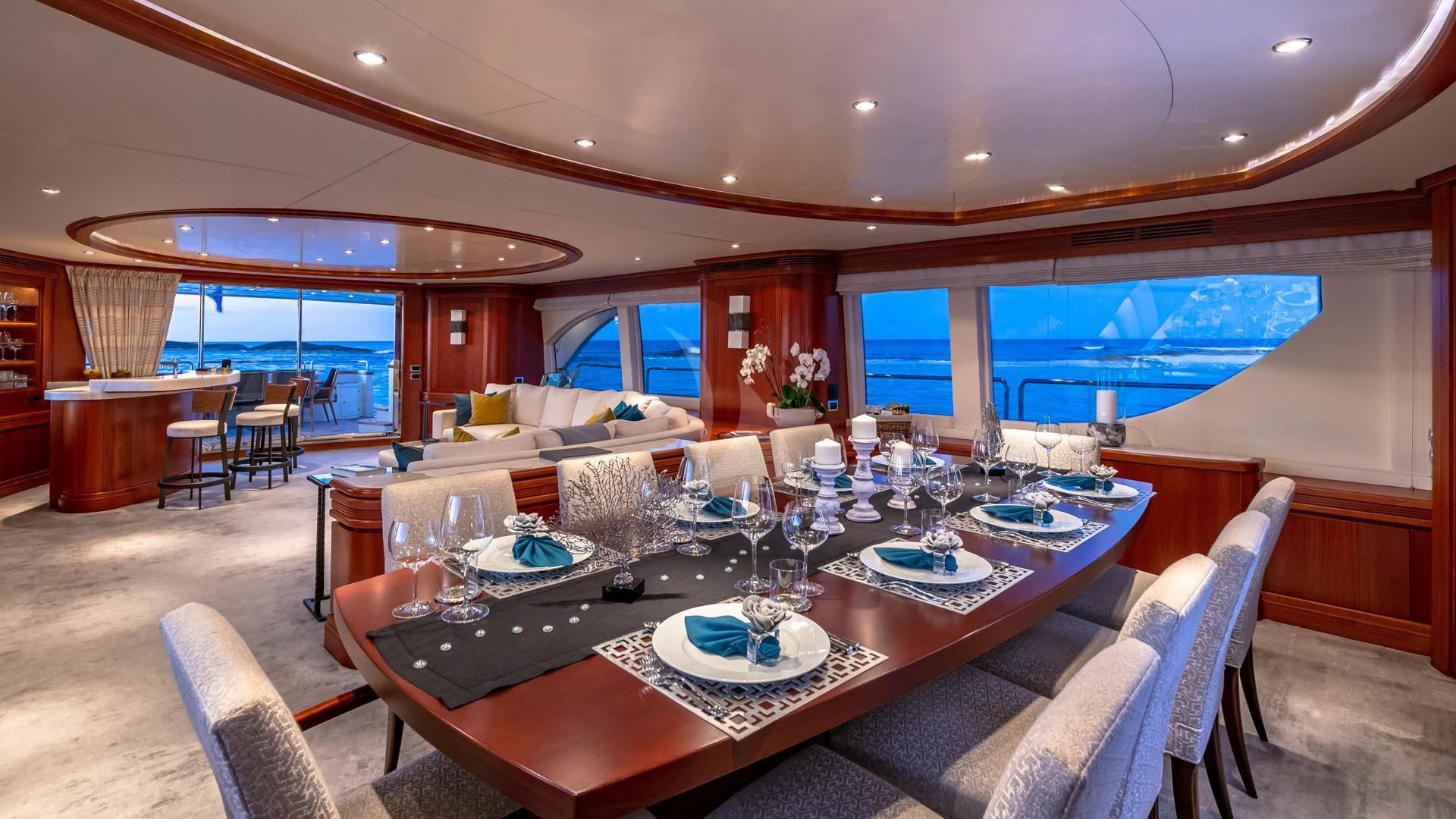 a large dining room with a large table and chairs aboard SWEET EMOCEAN Yacht for Sale