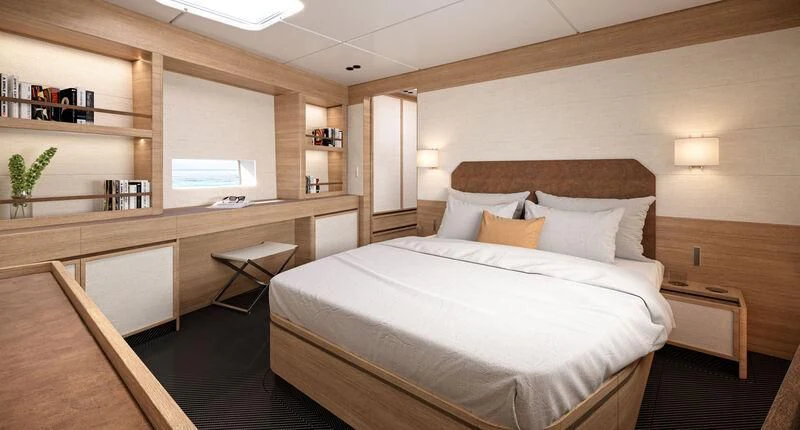 a large bedroom with a large bed aboard GALMA Yacht for Sale