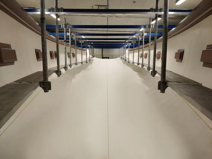 a large empty warehouse aboard GALMA Yacht for Sale