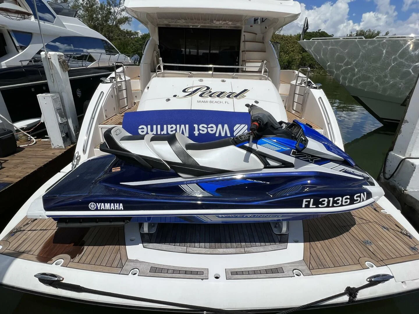 a boat parked on a dock aboard PEARL Yacht for Sale
