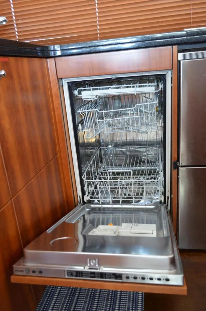 a small refrigerator is open aboard PEARL Yacht for Sale
