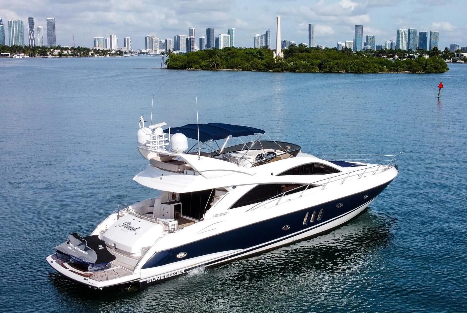 a white yacht on the water aboard PEARL Yacht for Sale