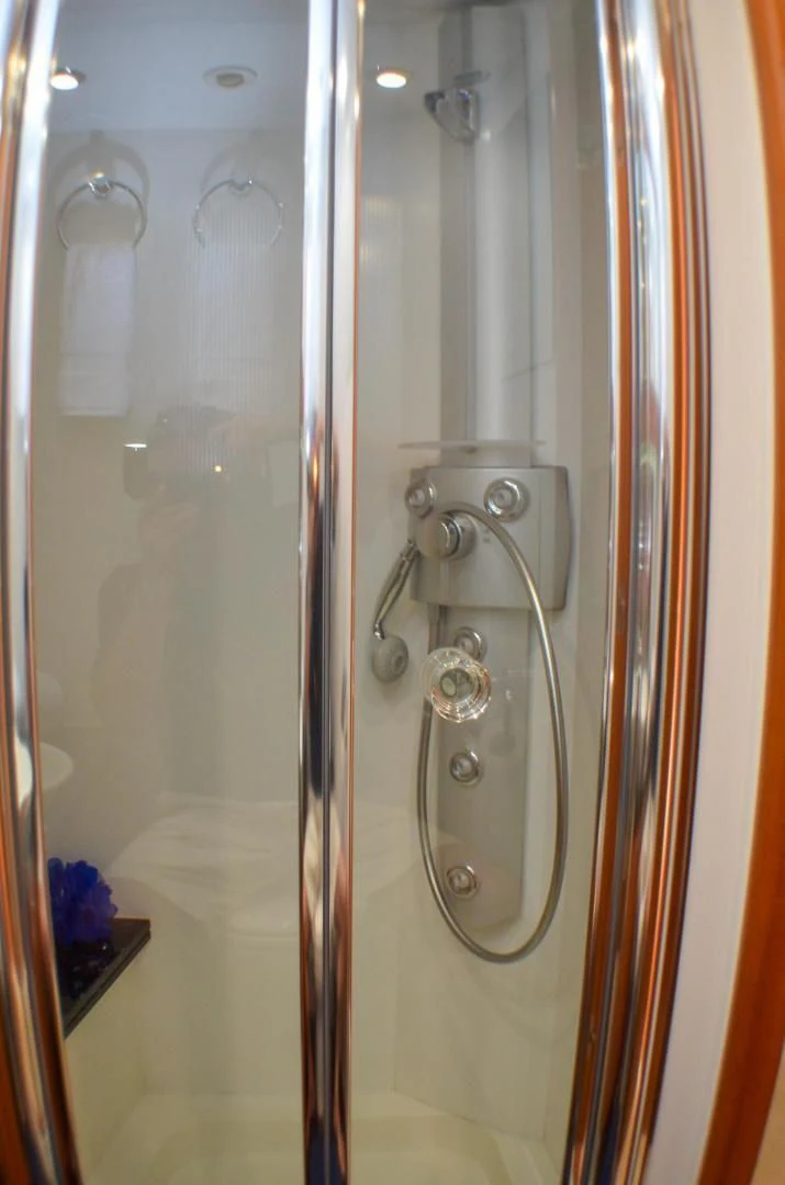 a shower with a glass door aboard PEARL Yacht for Sale