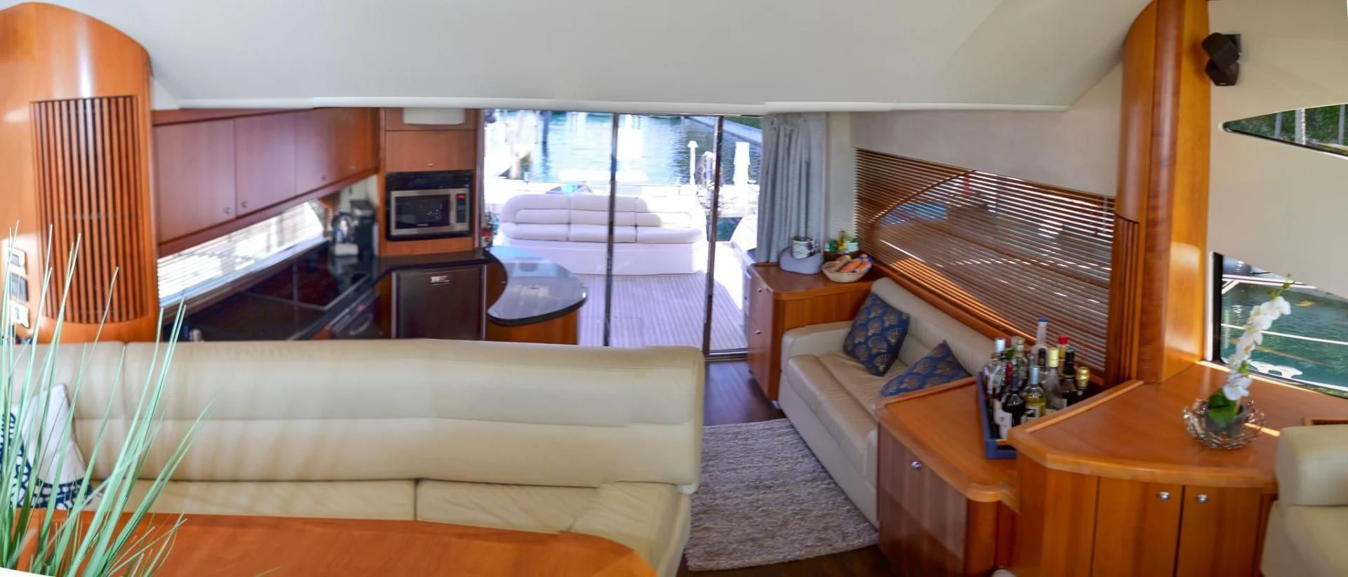a living room with a couch and a tv aboard PEARL Yacht for Sale