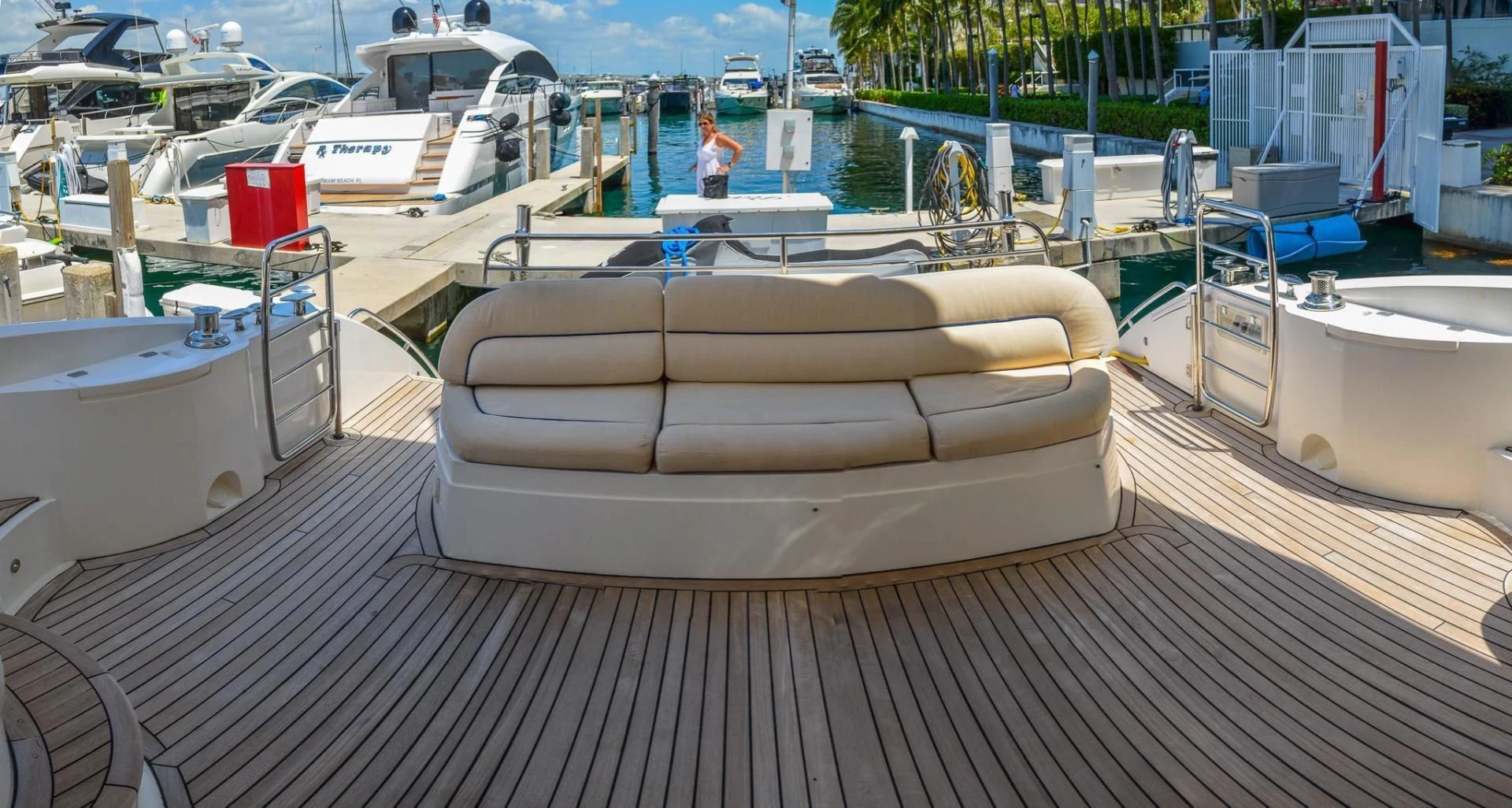 a wooden deck with a bench on it aboard PEARL Yacht for Sale