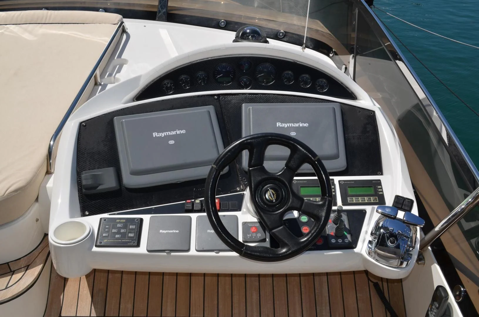 a black and silver car aboard PEARL Yacht for Sale