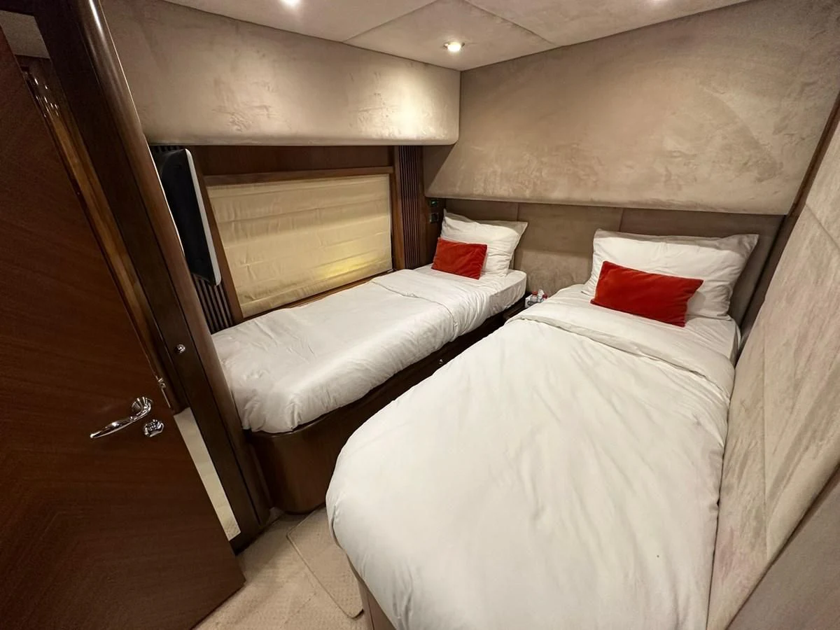 a room with two beds aboard MILA DUBAI Yacht for Sale