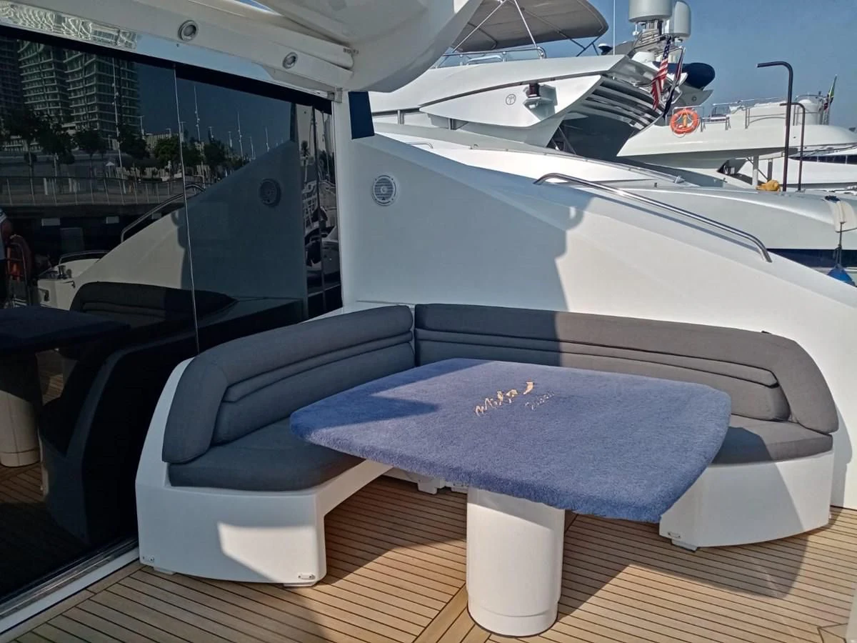 a boat on a deck aboard MILA DUBAI Yacht for Sale