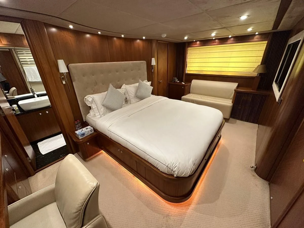 a hotel room with a bed aboard MILA DUBAI Yacht for Sale
