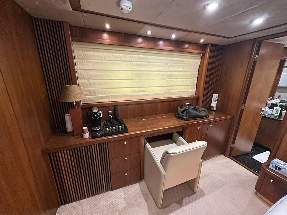a room with a desk and a chair aboard MILA DUBAI Yacht for Sale
