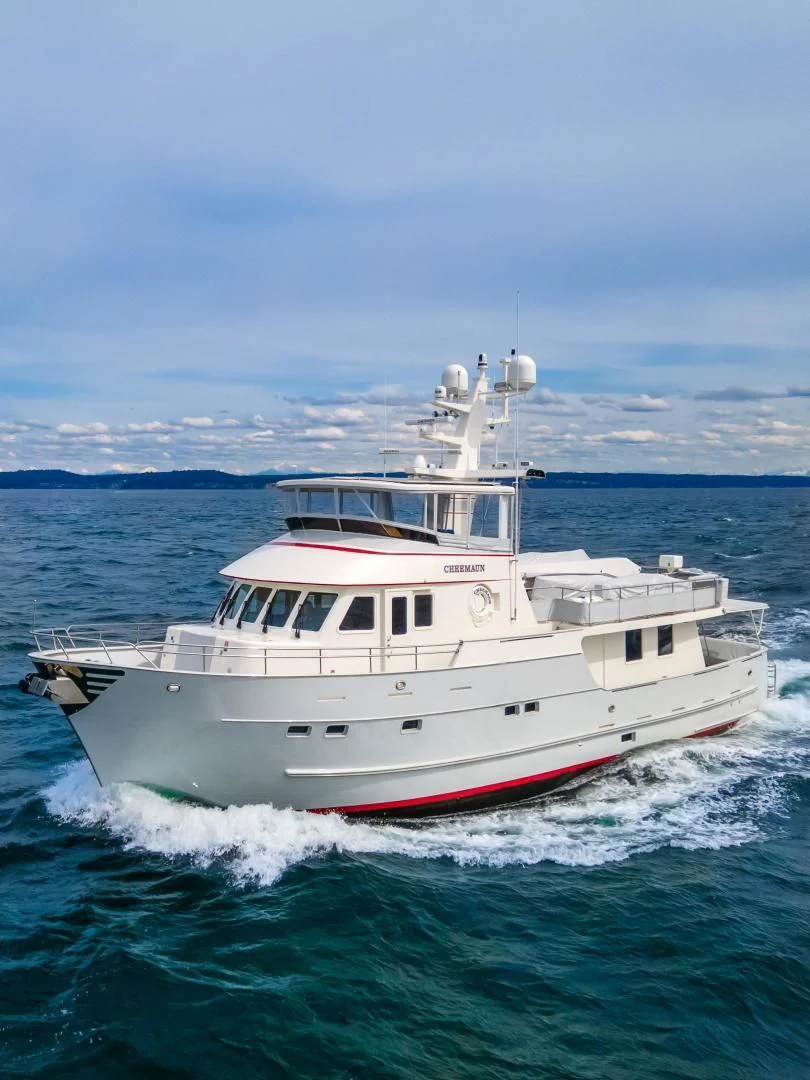 a white boat in the water aboard CHEEMAUN Yacht for Sale