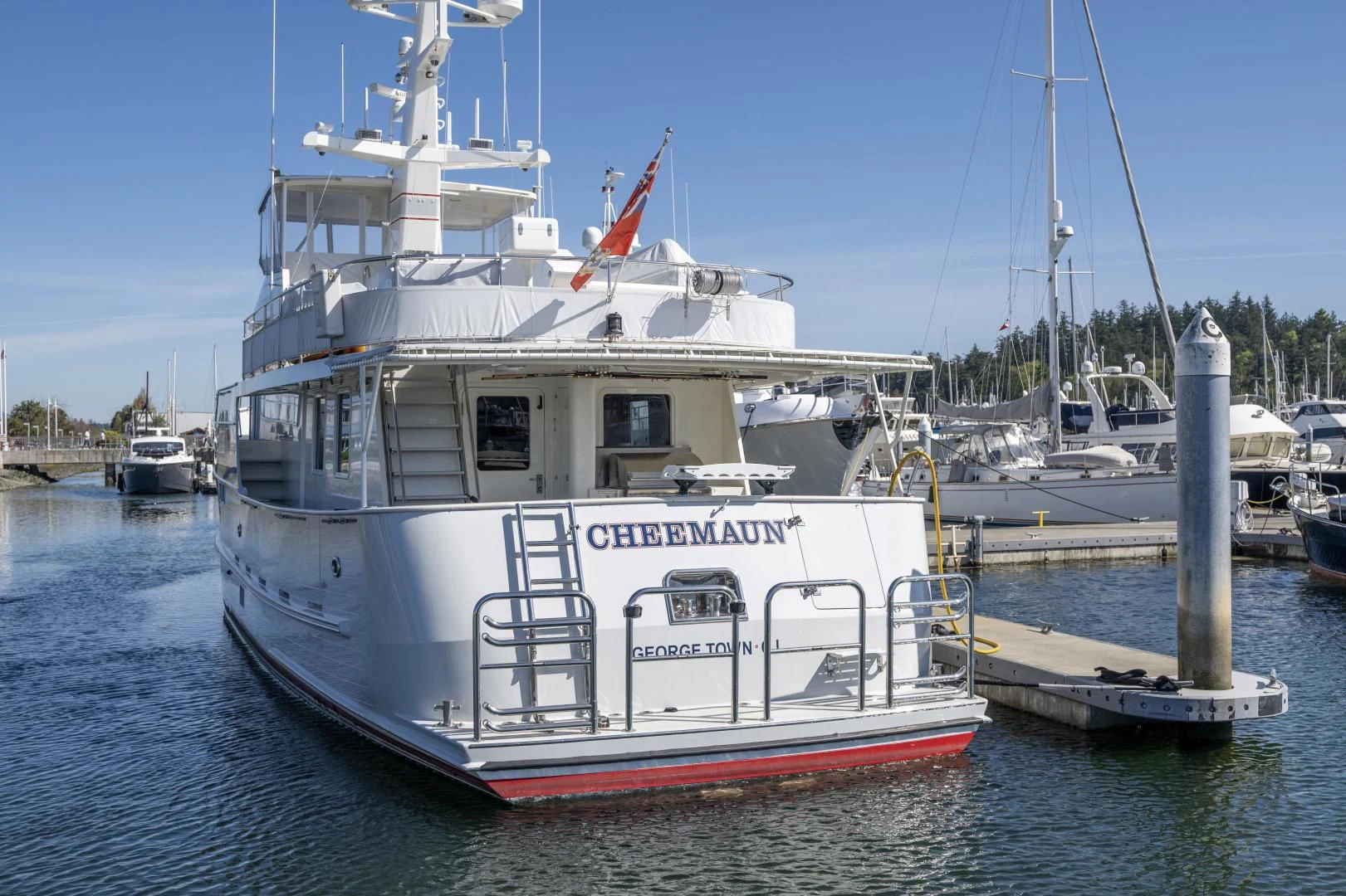 a boat docked at a pier aboard CHEEMAUN Yacht for Sale