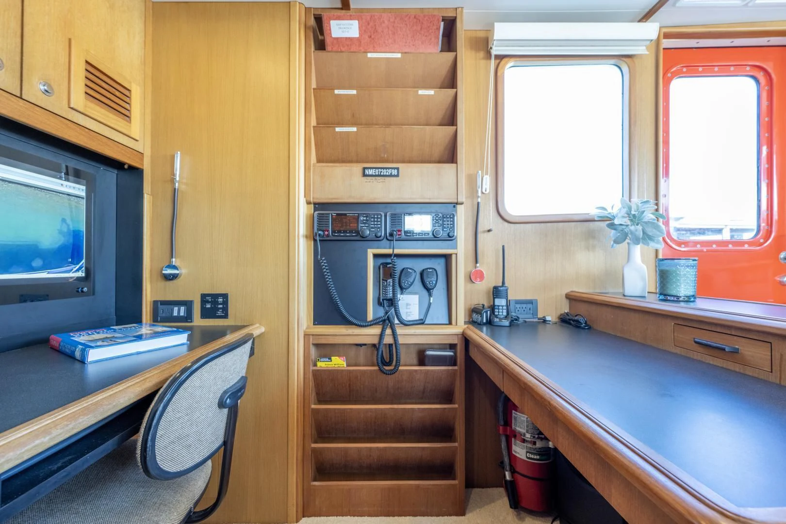 a room with a desk and a television aboard CHEEMAUN Yacht for Sale