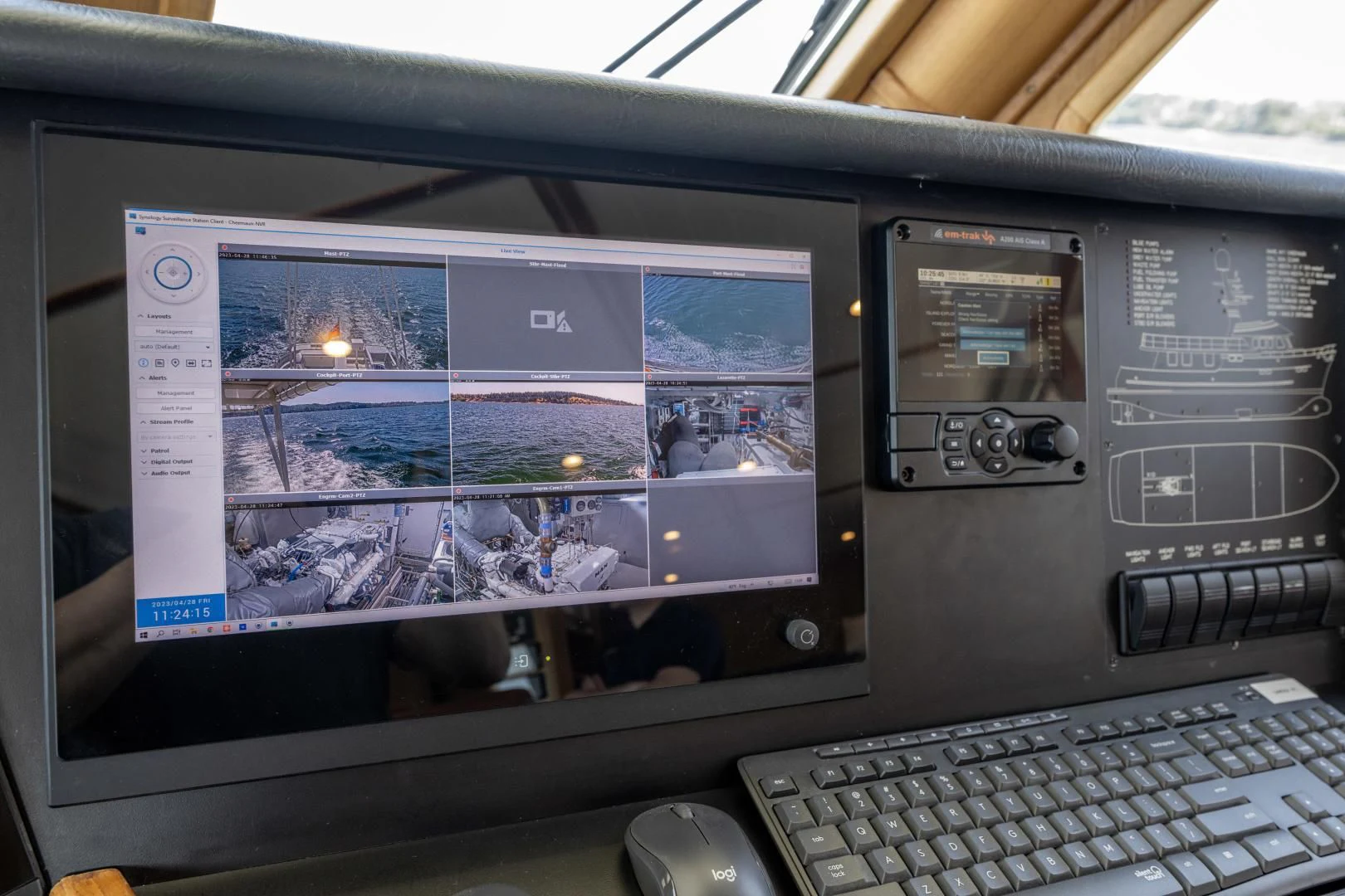 a computer with a screen and keyboard aboard CHEEMAUN Yacht for Sale
