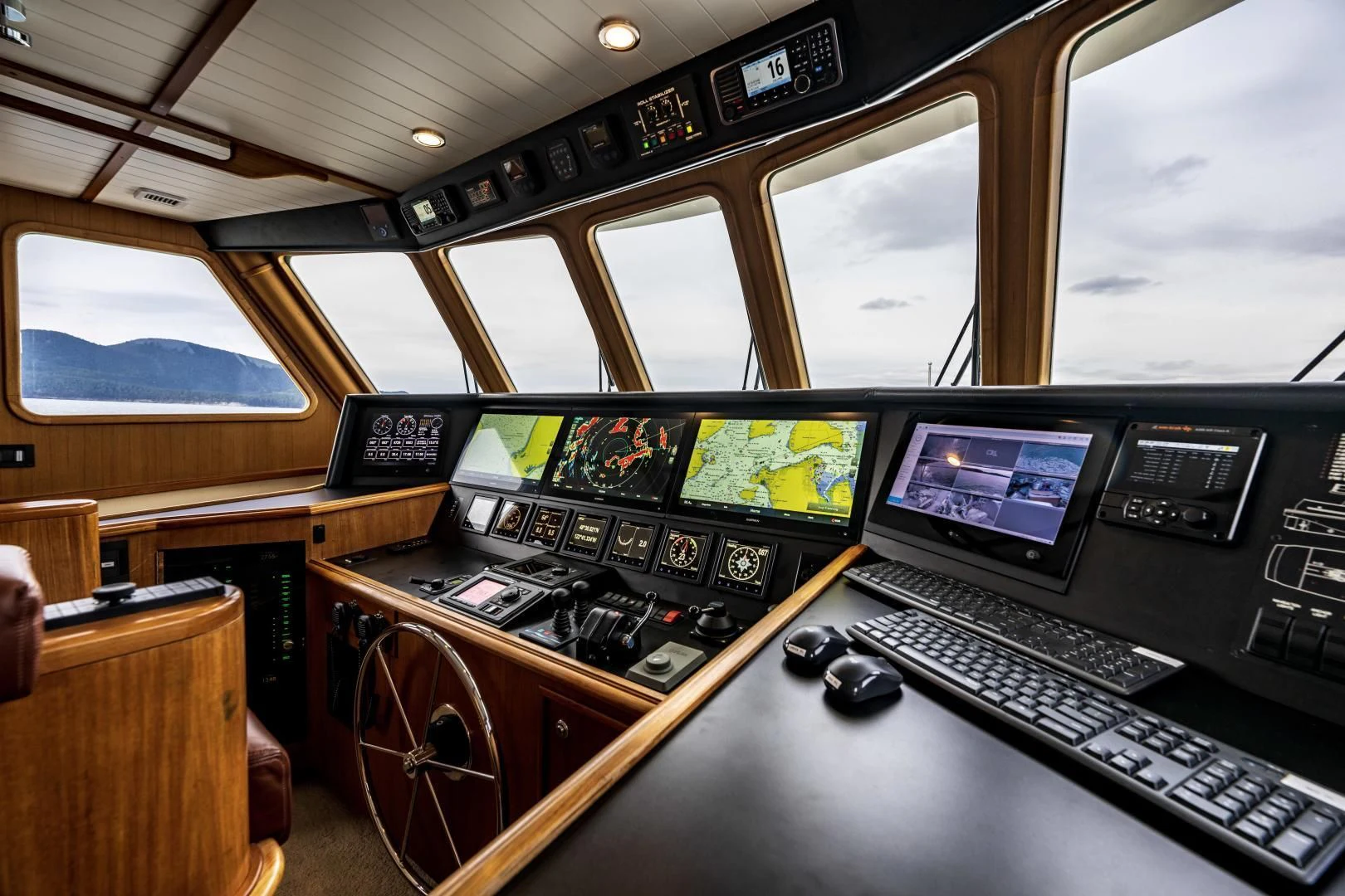 a control room with computers aboard CHEEMAUN Yacht for Sale