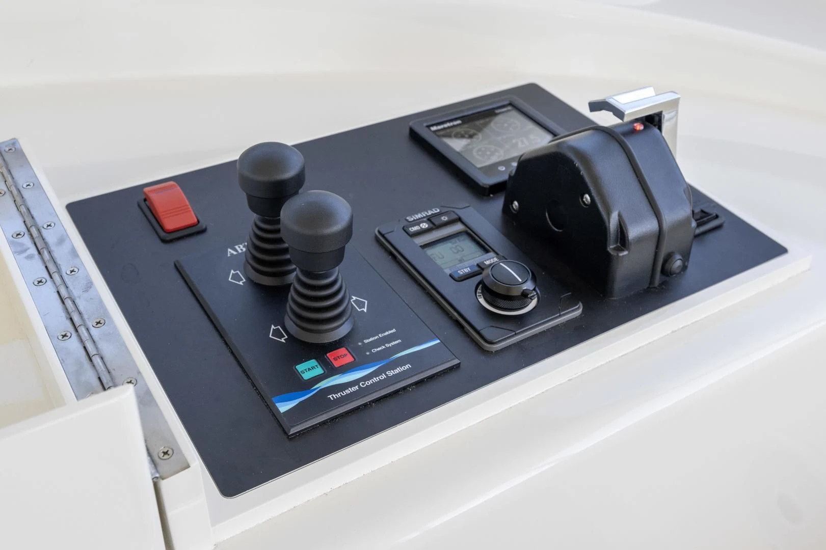 a black electronic device aboard CHEEMAUN Yacht for Sale