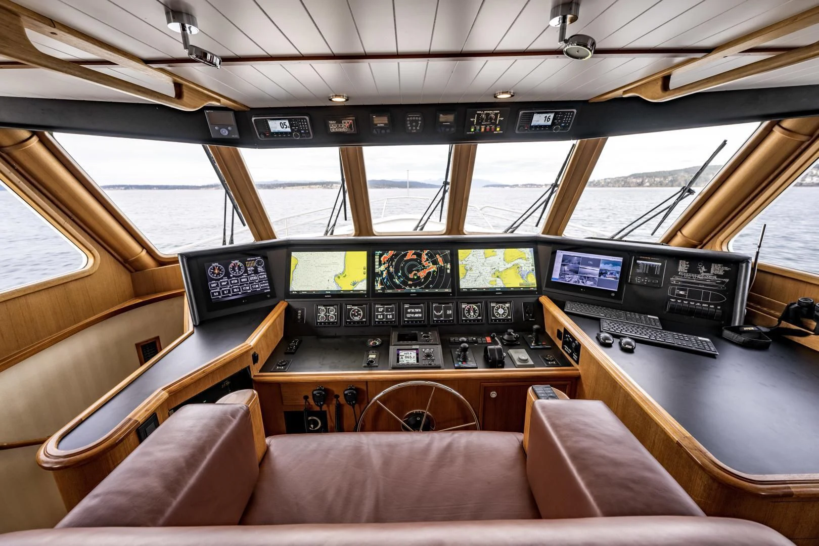 a boat with many screens aboard CHEEMAUN Yacht for Sale