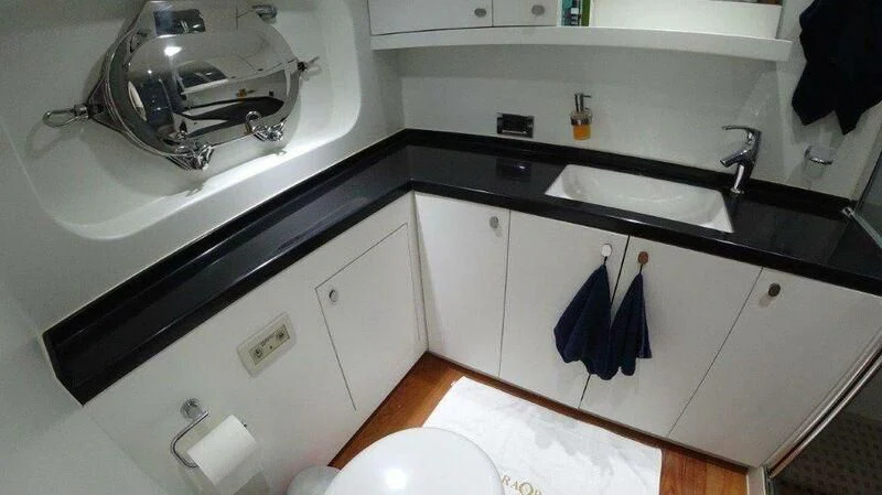 a kitchen with a sink and a large faucet aboard ERAORA Yacht for Sale