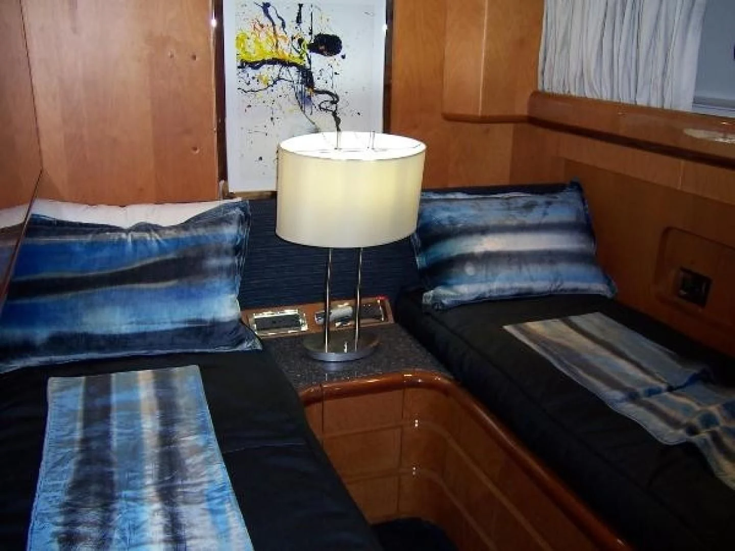 a lamp on a table aboard UNZIPPED Yacht for Sale