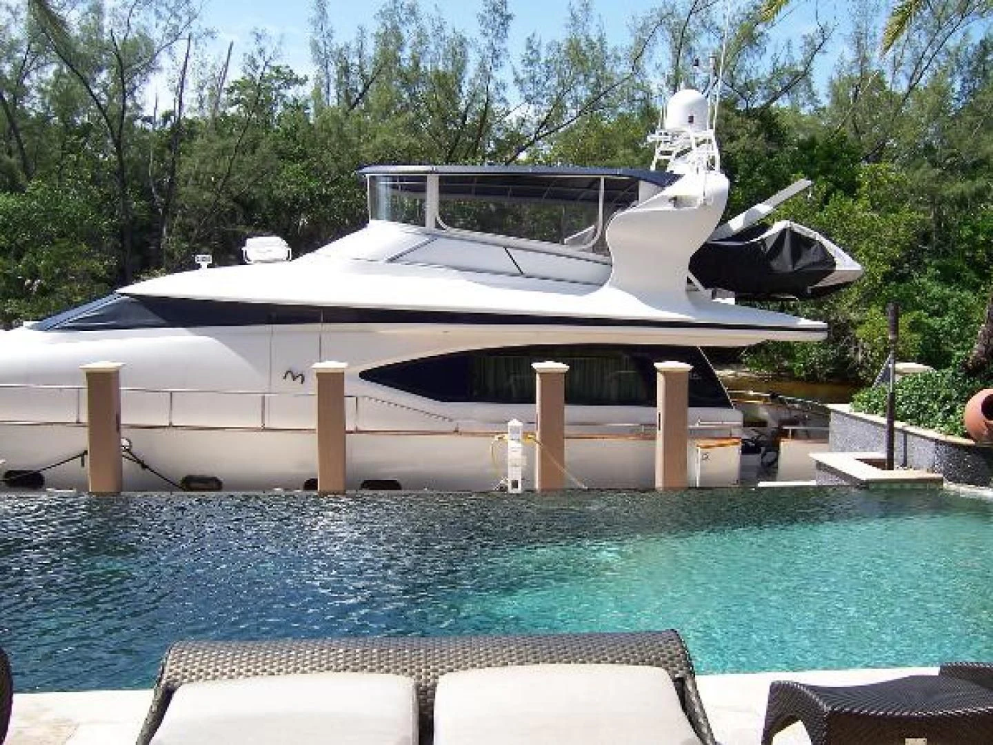 a boat in a pool aboard UNZIPPED Yacht for Sale