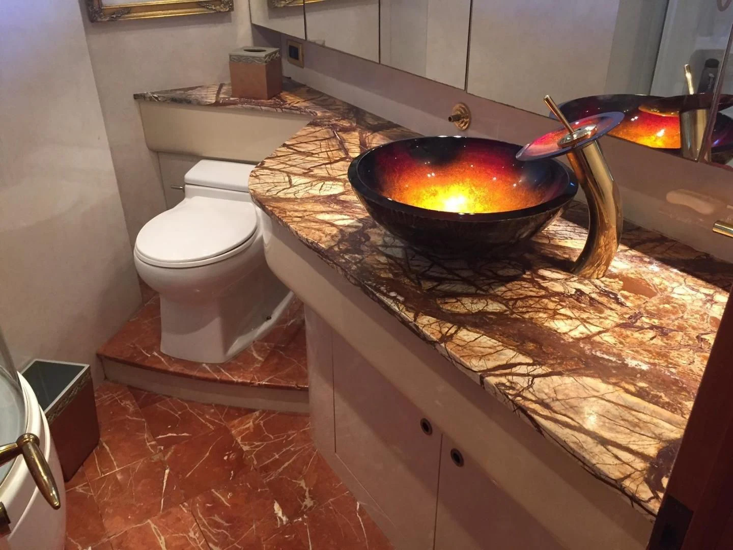 a bathroom with a large black bowl aboard UNZIPPED Yacht for Sale