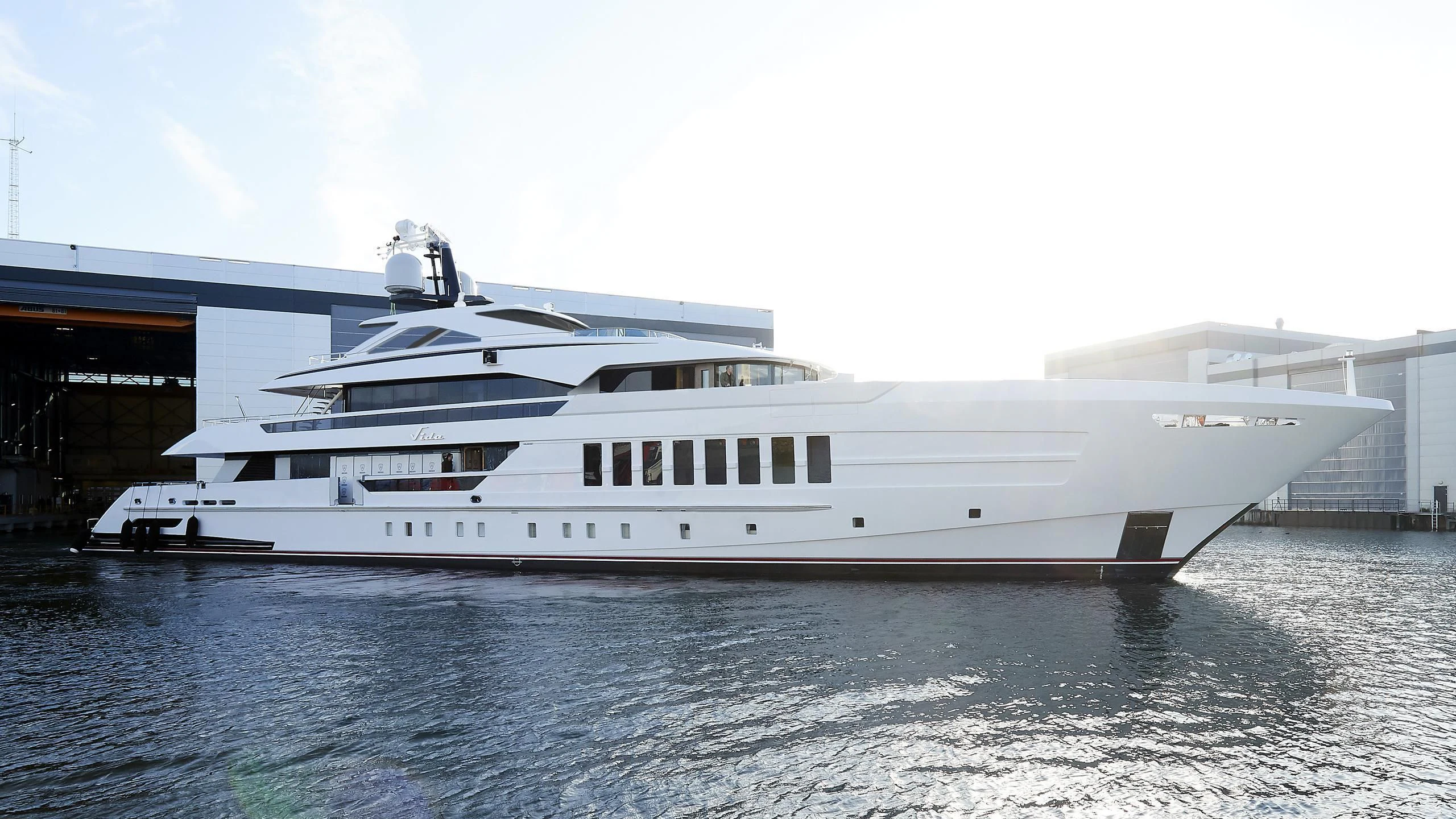 a white yacht in the water aboard VIDA Yacht for Sale