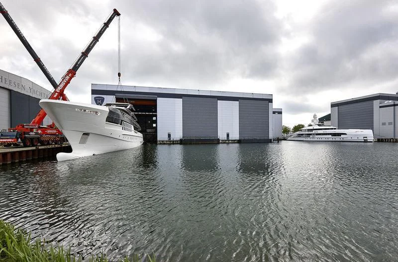 a building with a crane on the roof aboard VIDA Yacht for Sale