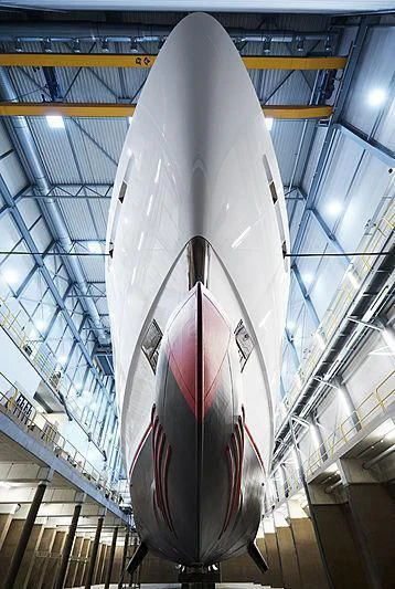 a large surfboard from a building aboard VIDA Yacht for Sale