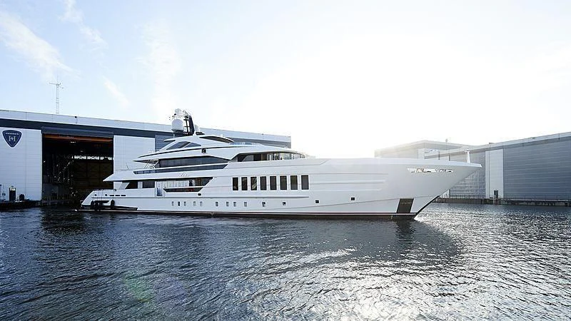 a white yacht in a body of water aboard VIDA Yacht for Sale