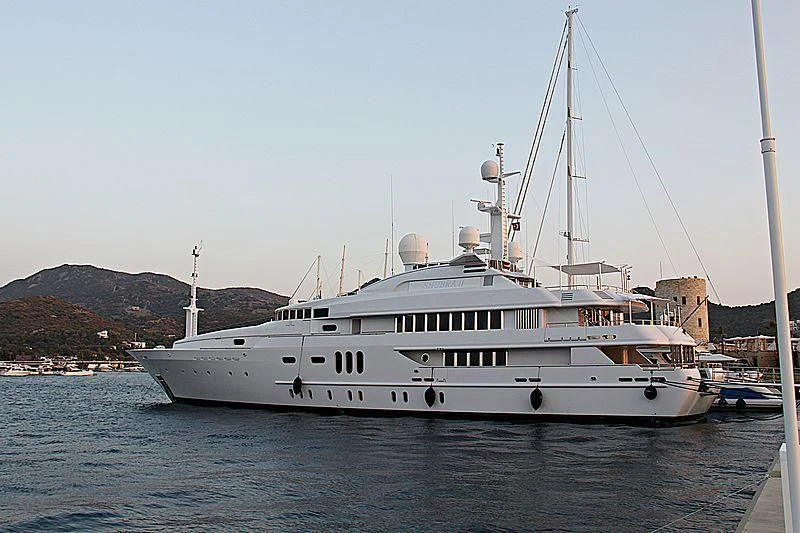 a large white boat in the water aboard PEARL Yacht for Sale