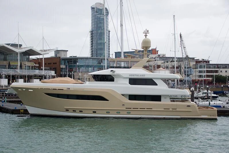 a white yacht in a harbor aboard NORTHLAND Yacht for Sale
