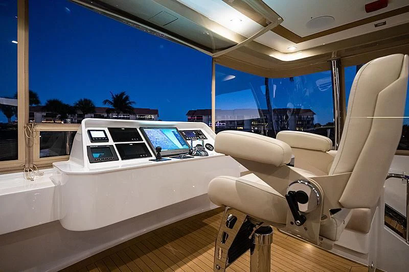 a white yacht on a deck aboard NORTHLAND Yacht for Sale