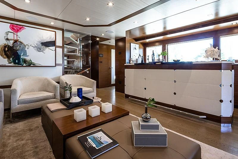 a living room with a large window aboard NORTHLAND Yacht for Sale
