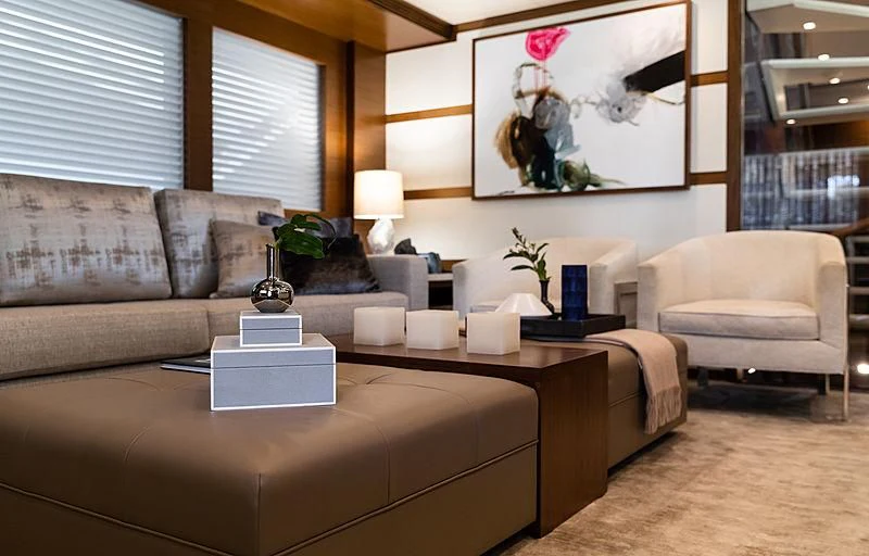 a living room with a couch and a bed aboard NORTHLAND Yacht for Sale