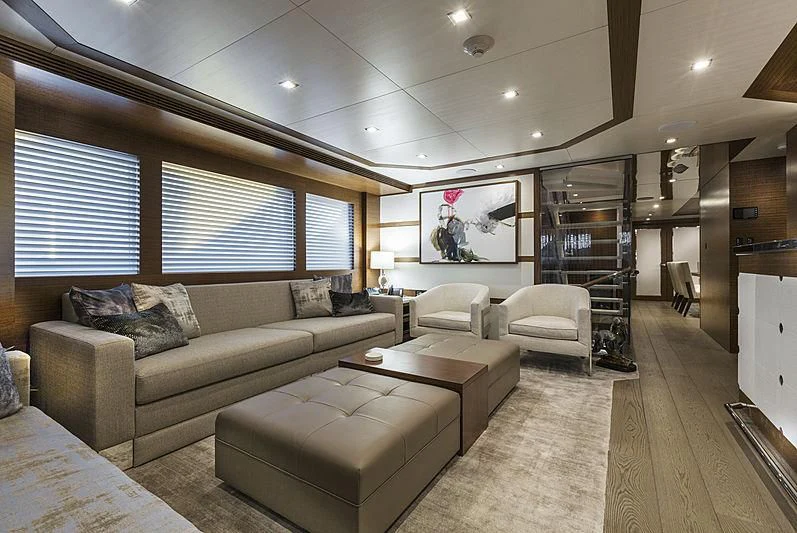a living room with a large window aboard NORTHLAND Yacht for Sale