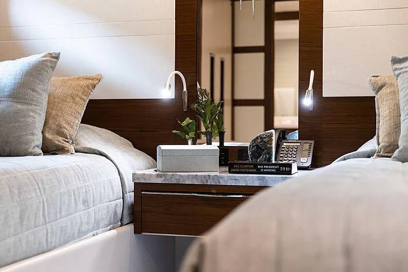 a room with a couch and a coffee table aboard NORTHLAND Yacht for Sale