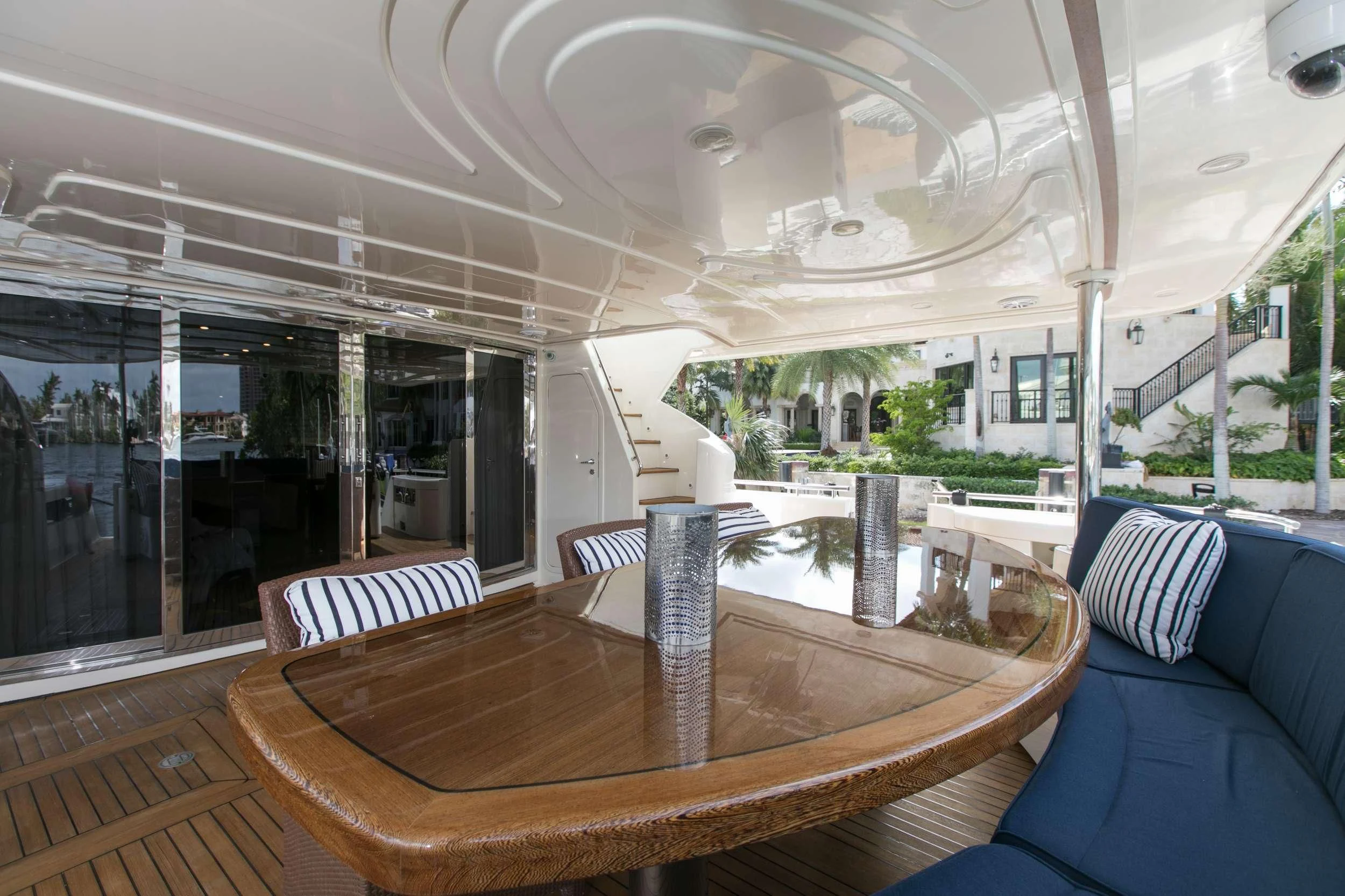 a large dining table in a room aboard MAMBO Yacht for Sale