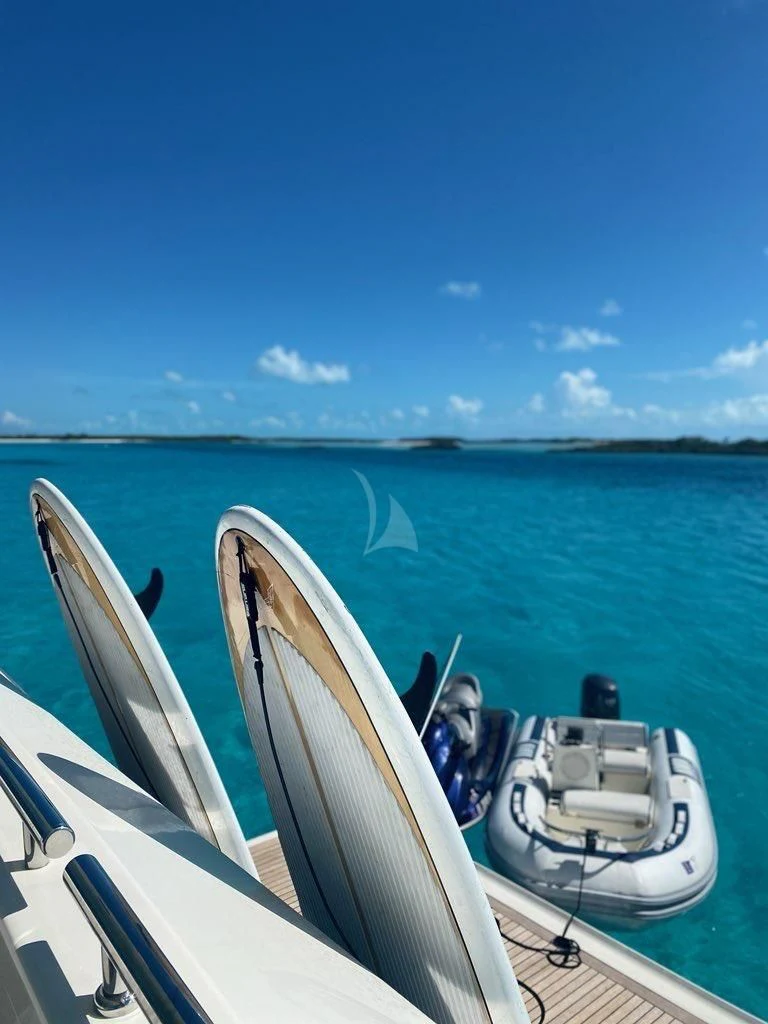 a boat with a person on it aboard MAMBO Yacht for Sale
