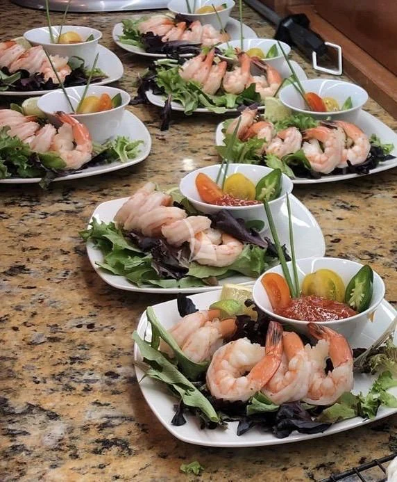 a table full of food aboard MAMBO Yacht for Sale