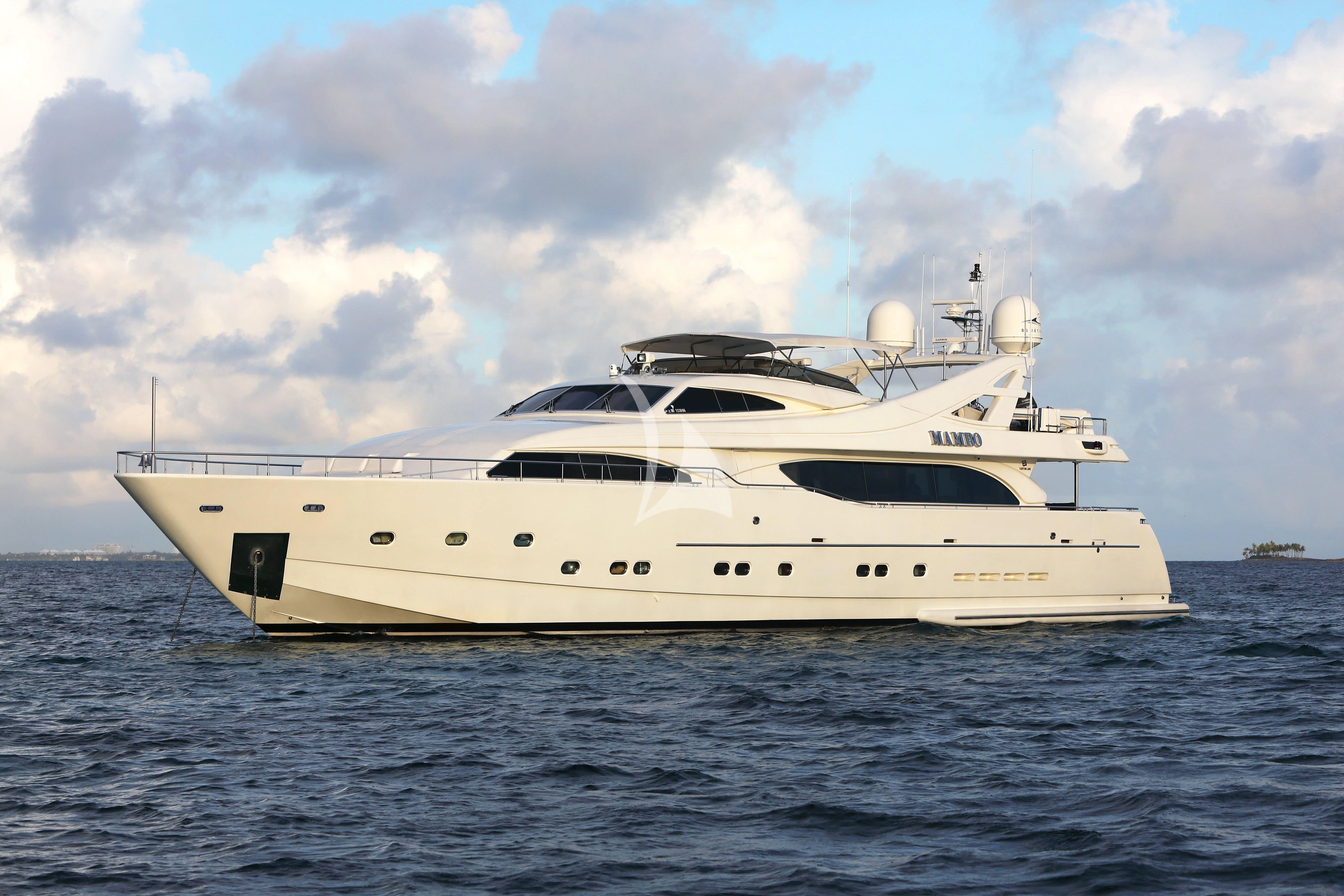 a white yacht on the water aboard MAMBO Yacht for Sale
