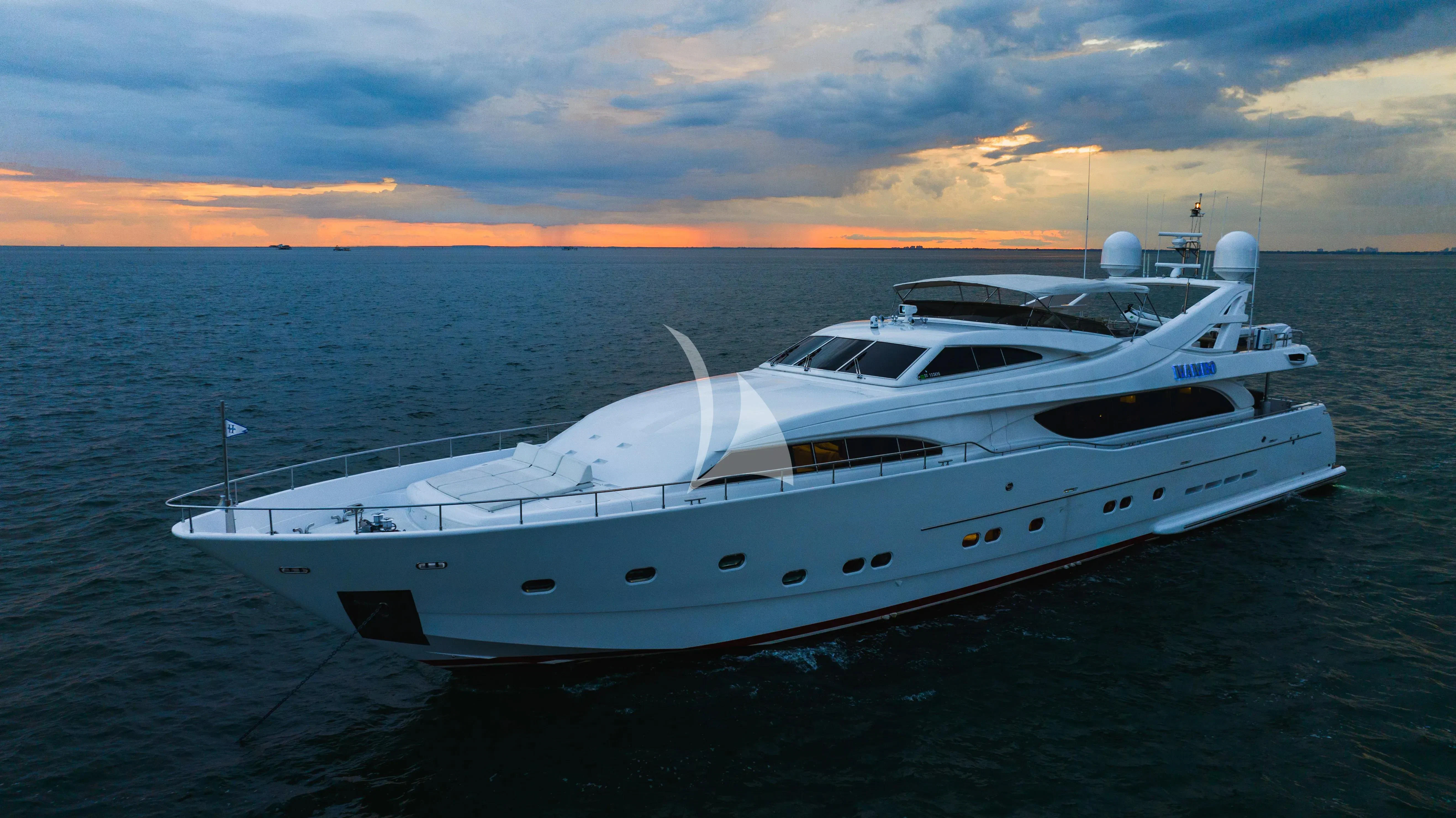 a white yacht in the water aboard MAMBO Yacht for Sale